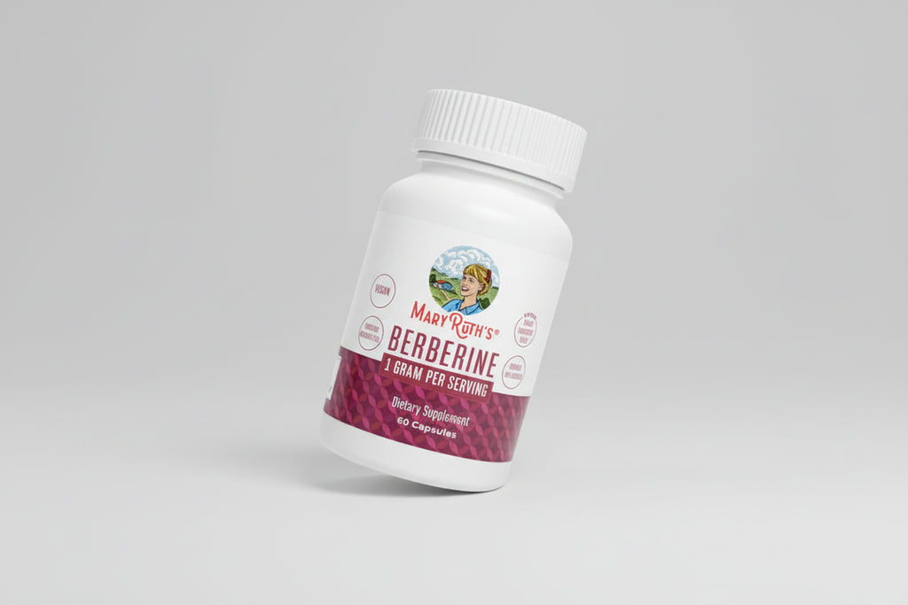 Mary Ruth's Berberine Capsules bottle on a red background with product details and certifications.