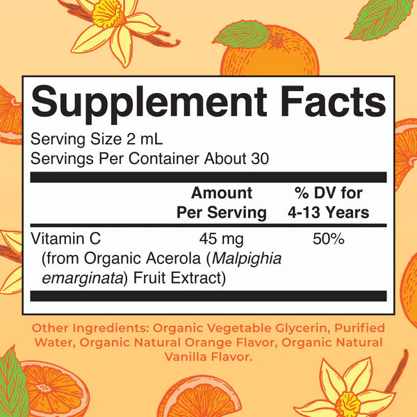 Supplement facts label with vitamin C content on a decorative background with oranges and vanilla flowers.