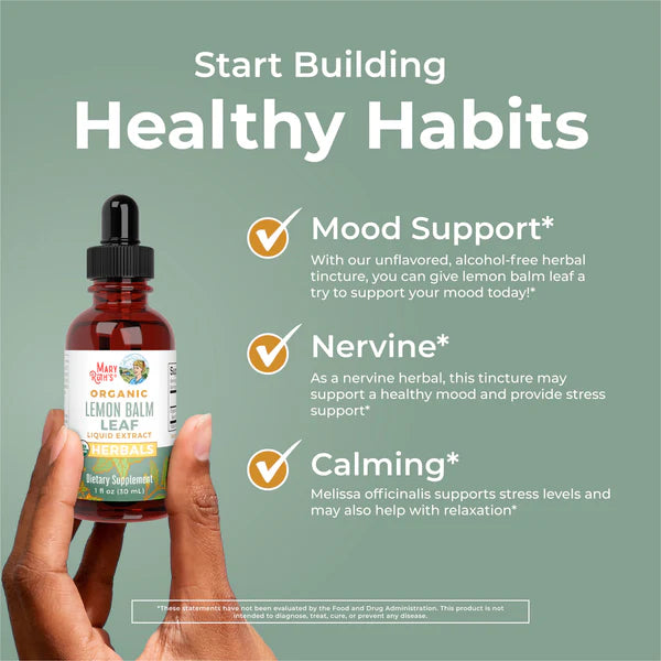 Bottle of lemon balm leaf tincture with text on a green background