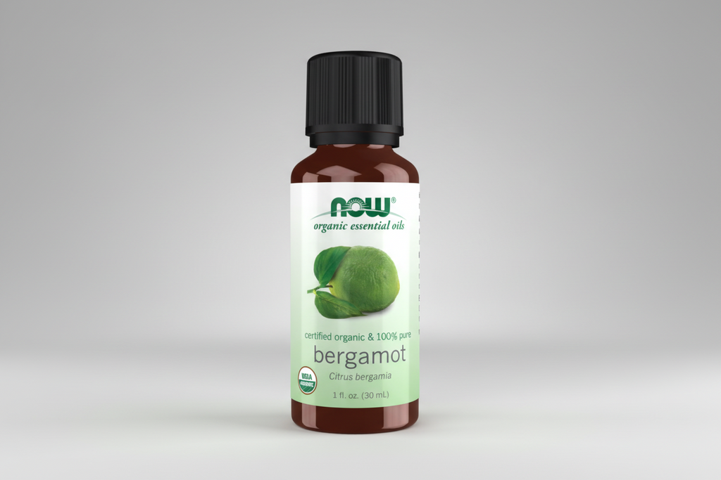 Bottle of NOW Organic Essential Oils bergamot on a white background