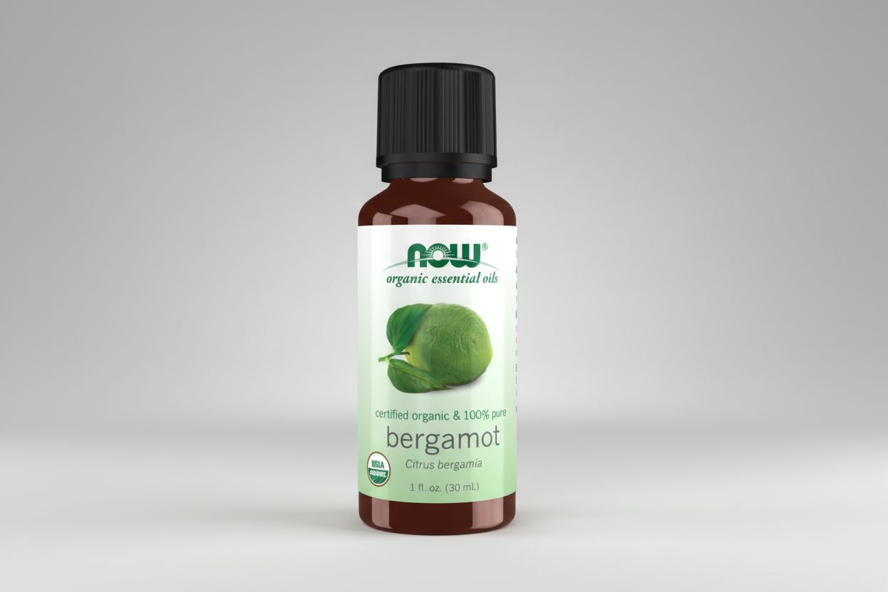 Bottle of NOW Organic Essential Oils bergamot on a white background