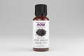 Bottle of black pepper essential oil with NOW brand on a white background