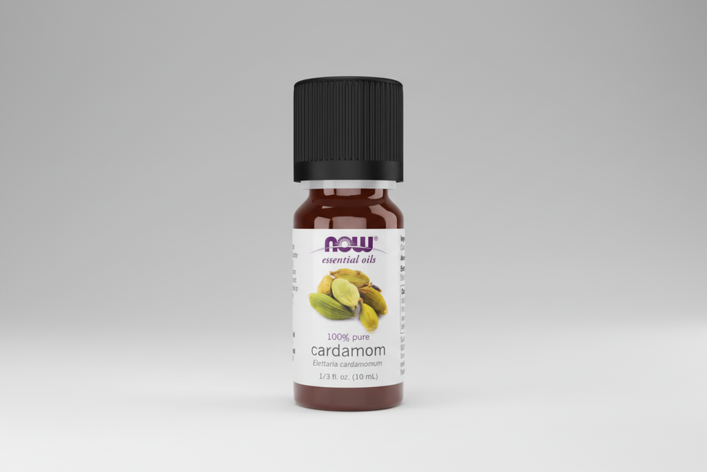 Bottle of NOW essential oils with cardamom flavor on a white background