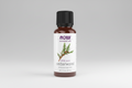 Bottle of NOW Essential Oils Cedarwood oil on a white background
