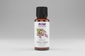 Bottle of NOW Clary Sage essential oil on a white background