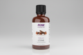 Bottle of NOW Essential Oils clove oil on a white background