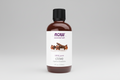 Bottle of NOW Essential Oils clove oil on a white background
