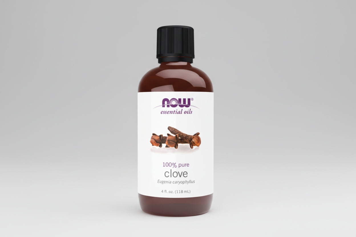 Bottle of NOW Essential Oils clove oil on a white background