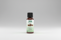 Bottle of NOW Organic Essential Oils Clove on a white background