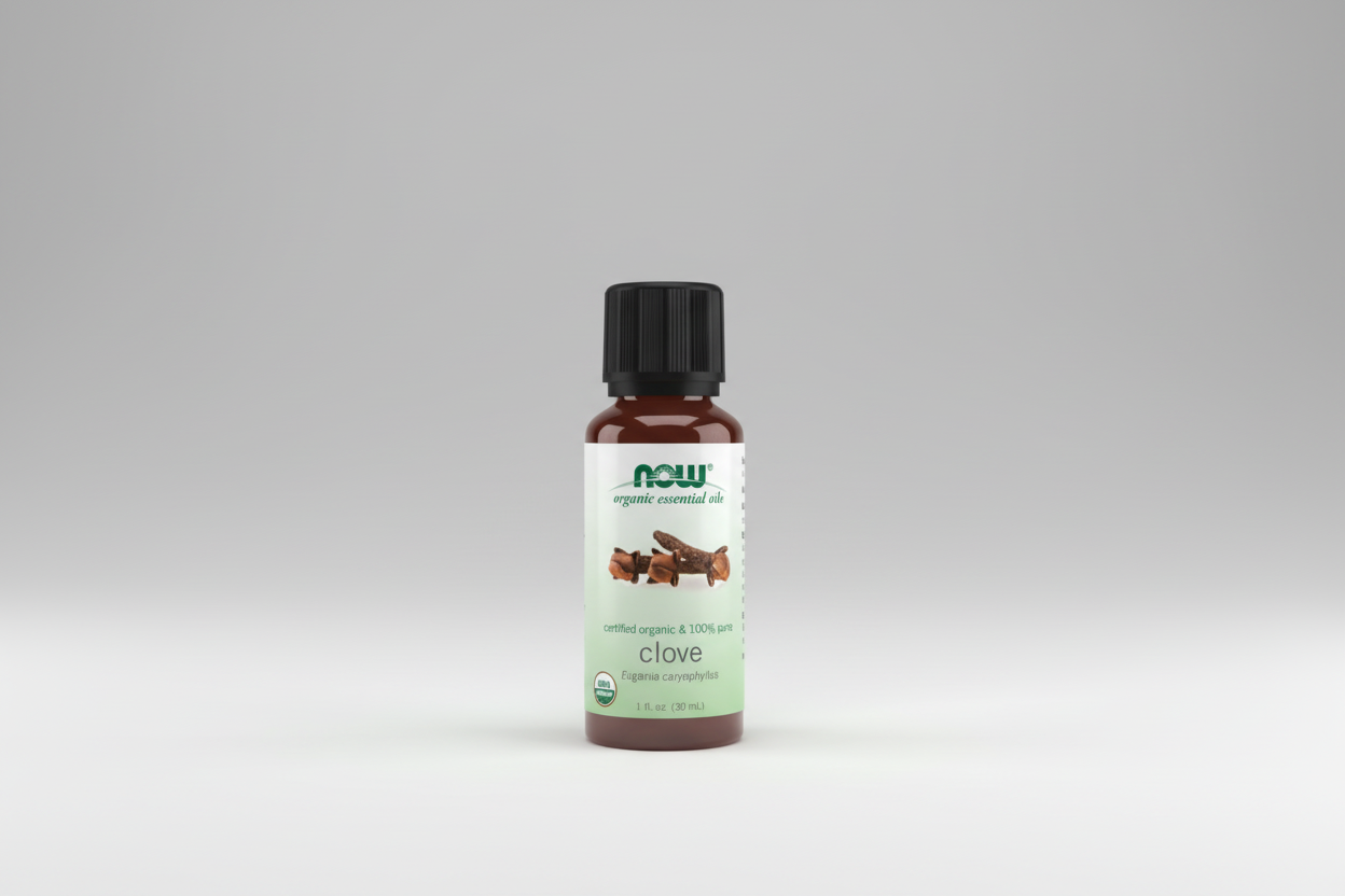Bottle of NOW Organic Essential Oils Clove on a white background