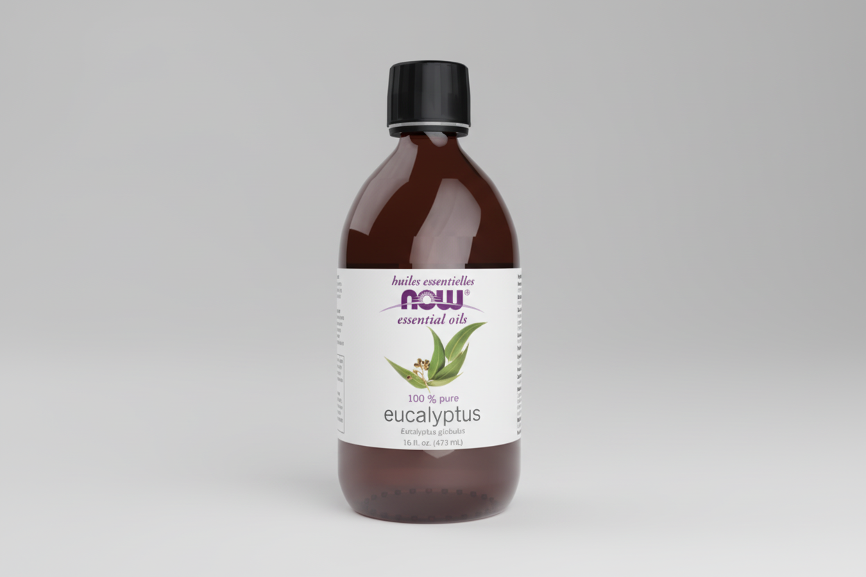 Bottle of eucalyptus essential oil with NOW brand label on a white background