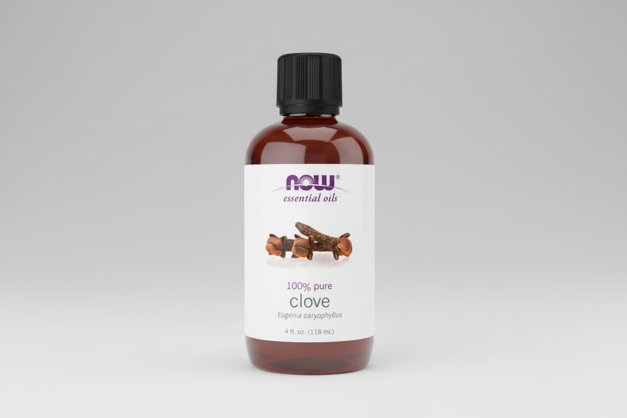 Bottle of NOW Essential Oils clove oil on a white background