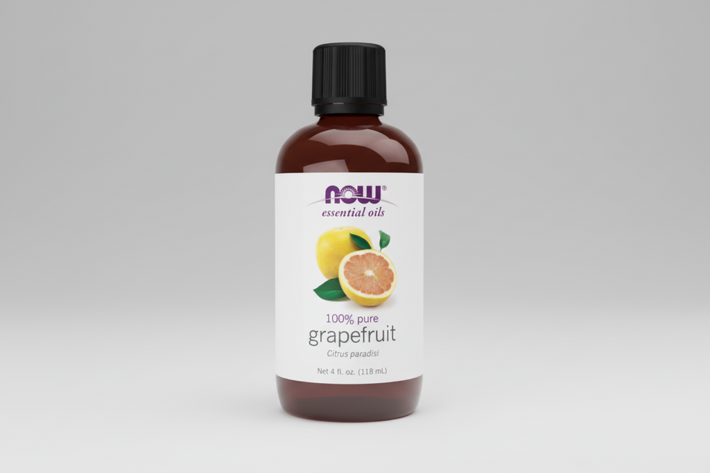 Bottle of NOW essential oils with grapefruit flavor on a white background