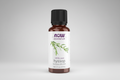 Bottle of NOW essential oils hyssop on a white background