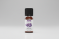 Bottle of NOW Essential Oils lavender oil on a white background