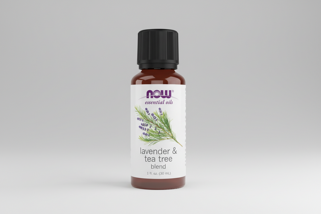 Bottle of NOW Lavender & Tea Tree Blend essential oil on a white background