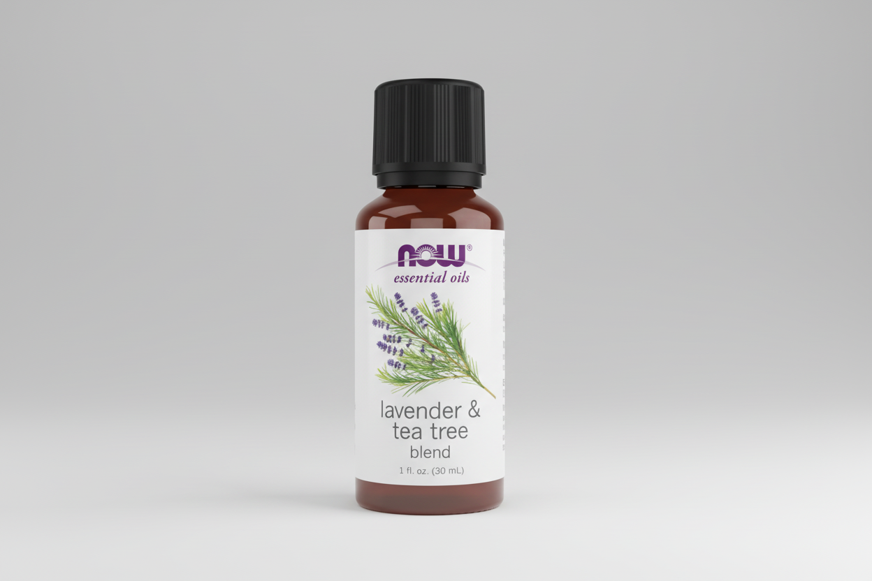 Bottle of NOW Lavender & Tea Tree Blend essential oil on a white background