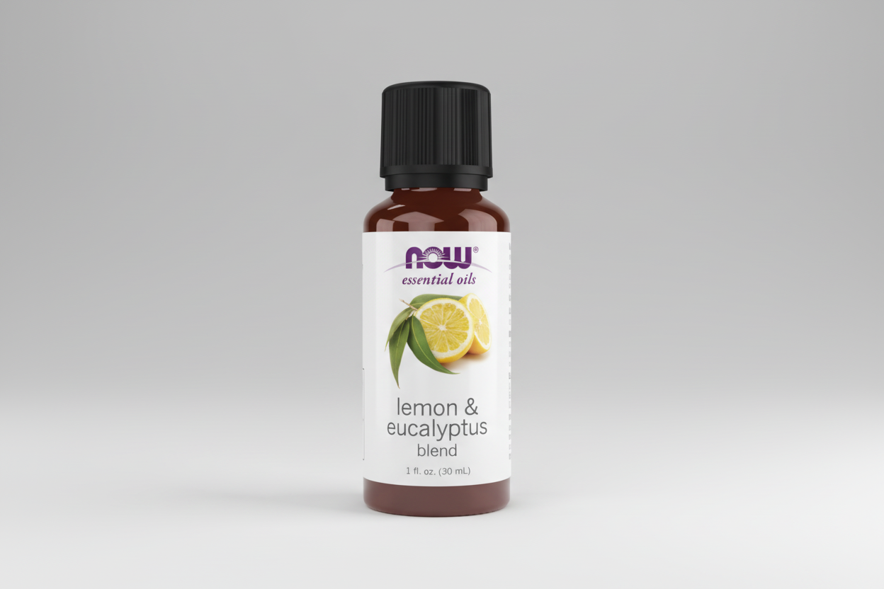 Bottle of NOW Lemon & Eucalyptus blend essential oil on a white background
