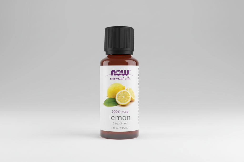 Bottle of NOW lemon essential oil on a white background