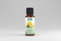 Bottle of NOW Organic Lemon Essential Oil on a white background