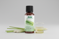 Bottle of NOW Organic Essential Oils Lemongrass on a white background