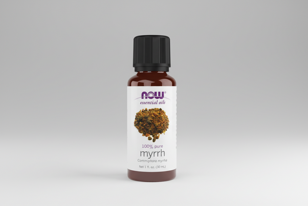 Bottle of NOW essential oils myrrh on a white background