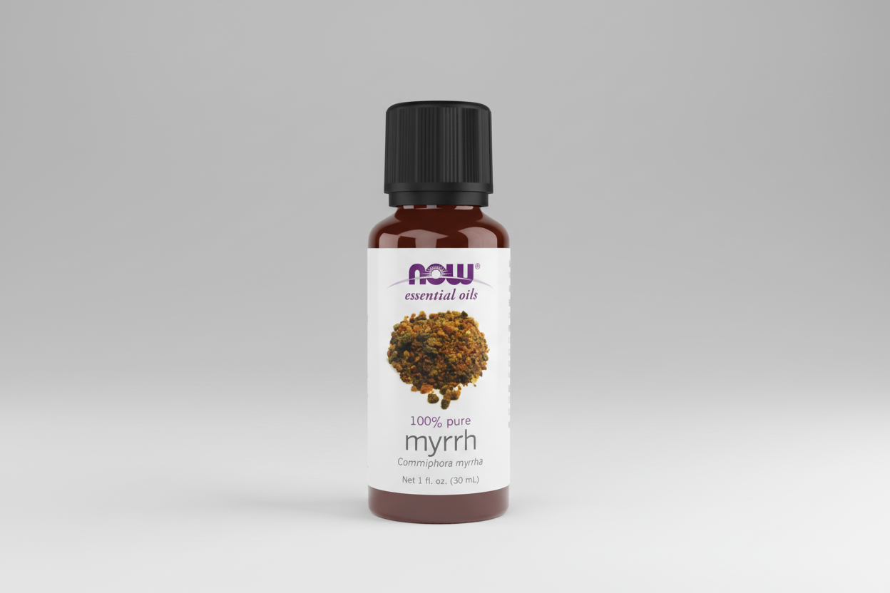 Bottle of NOW essential oils myrrh on a white background