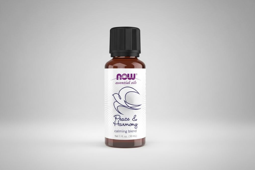 Bottle of NOW Peace & Harmony essential oil blend on a white background