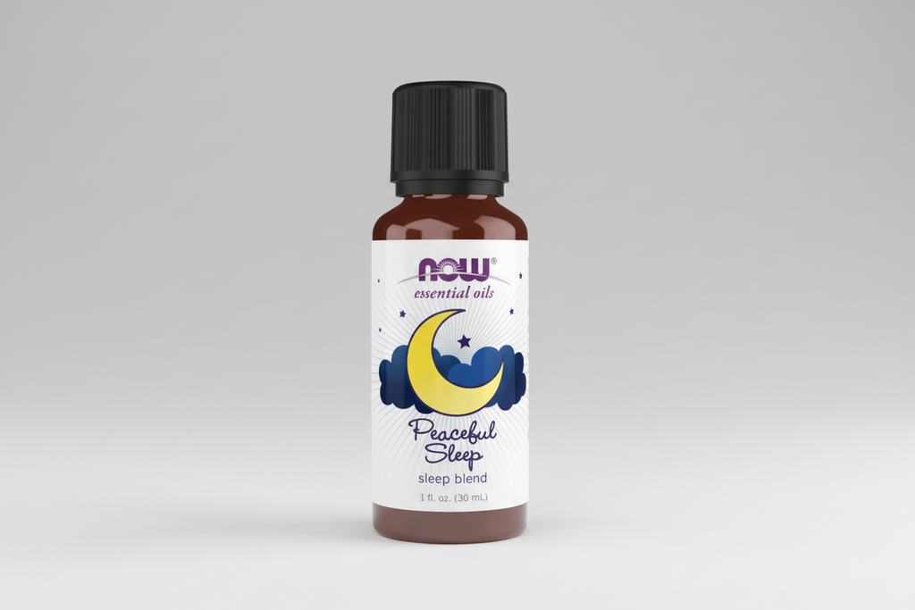 Bottle of NOW Essential Oils Peaceful Sleep blend on a white background