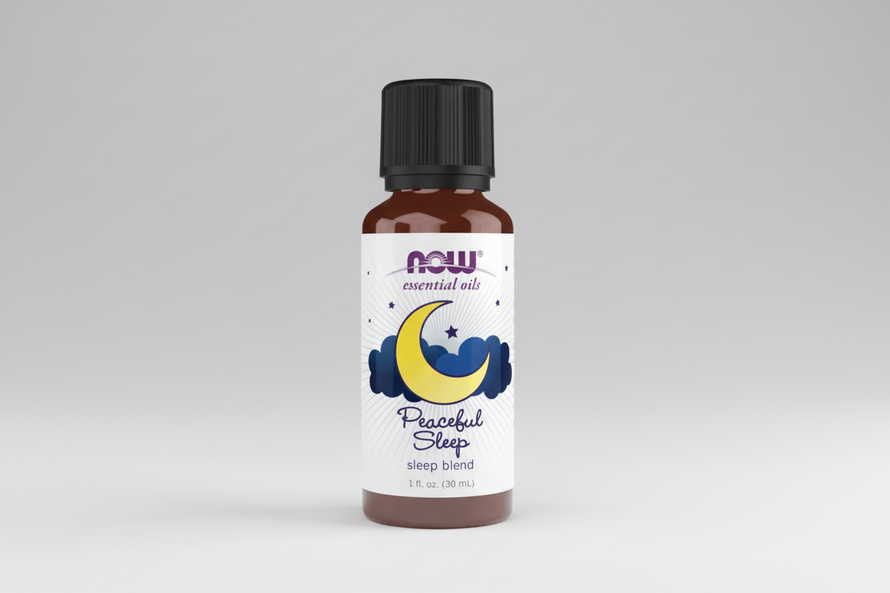 Bottle of NOW Essential Oils Peaceful Sleep blend on a white background