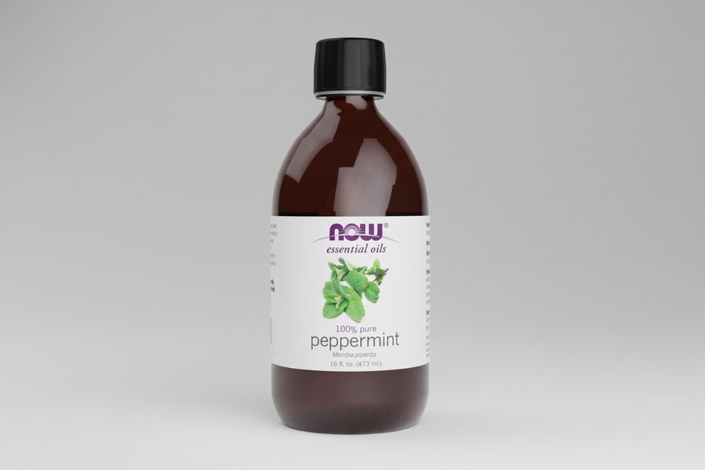 Bottle of peppermint essential oil with a NOW Foods label on a white background