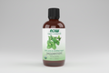 Bottle of NOW Organic Essential Oils peppermint oil on a white background