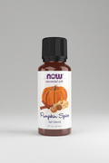 Bottle of NOW Pumpkin Spice essential oil blend on a white background