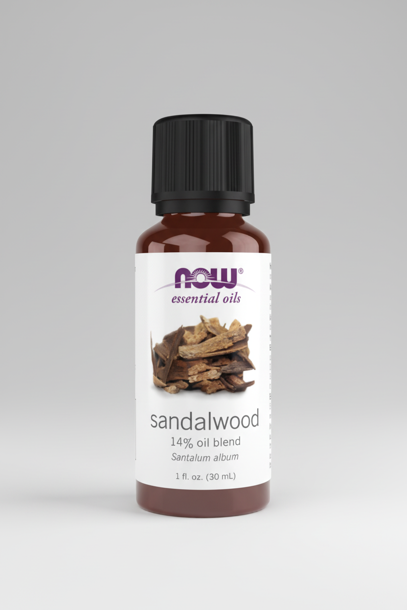 Sandalwood essential oil bottle with NOW brand on a white background