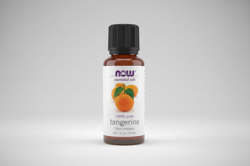 Bottle of Now Essential Oils tangerine oil on a white background