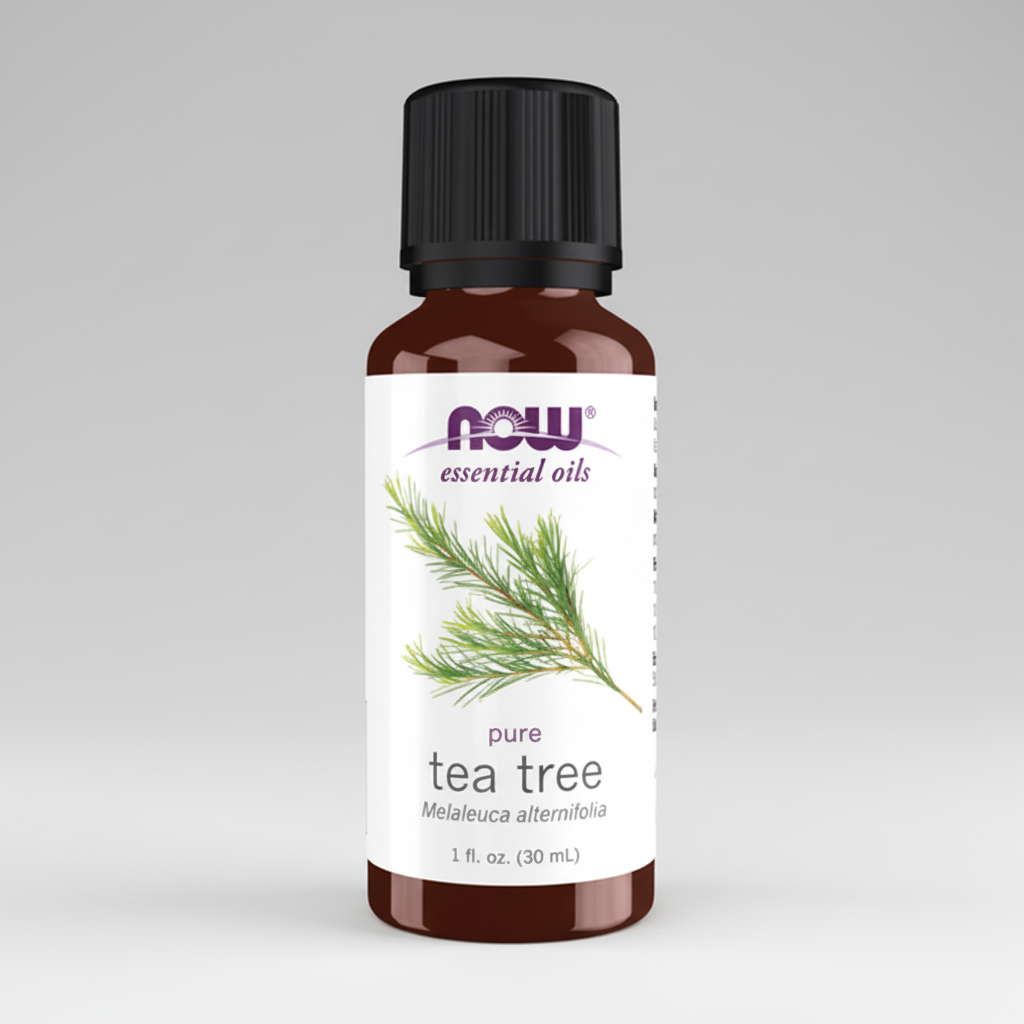 Bottle of NOW Essential Oils pure tea tree oil on a white background