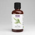 Bottle of NOW Essential Oils pure tea tree oil on a white background