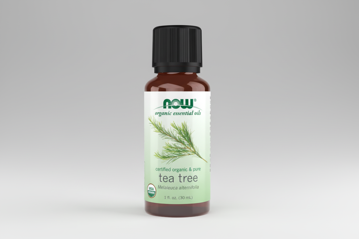 Bottle of NOW Organic Essential Oils Tea Tree oil on a white background