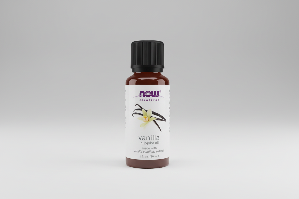 Bottle of vanilla extract in jojoba oil with NOW Solutions label on a white background