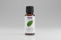 Bottle of NOW Essential Oils wintergreen oil on a white background