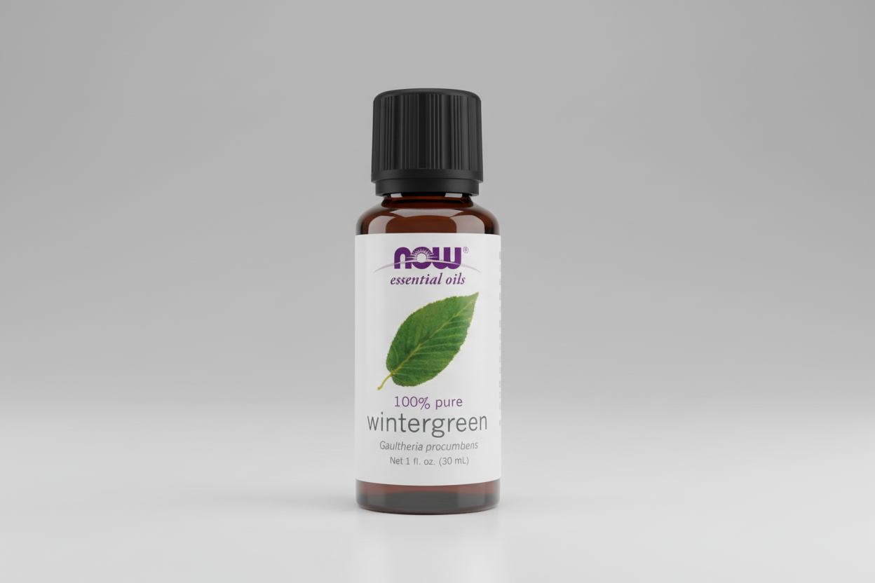 Bottle of NOW Essential Oils wintergreen oil on a white background