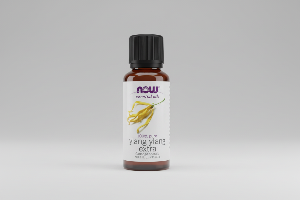 Bottle of NOW Essential Oils ylang ylang extra on a white background