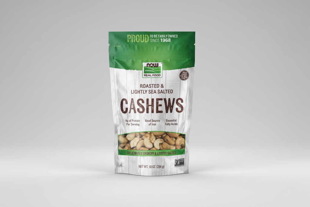 Package of roasted and lightly sea salted cashews with green and white design.