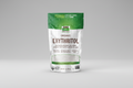 Package of organic erythritol on a white background