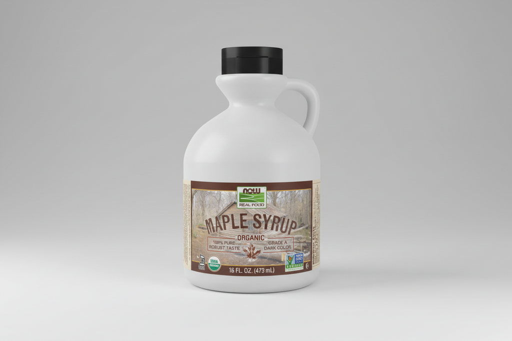 Jar of maple syrup with a label on a white background