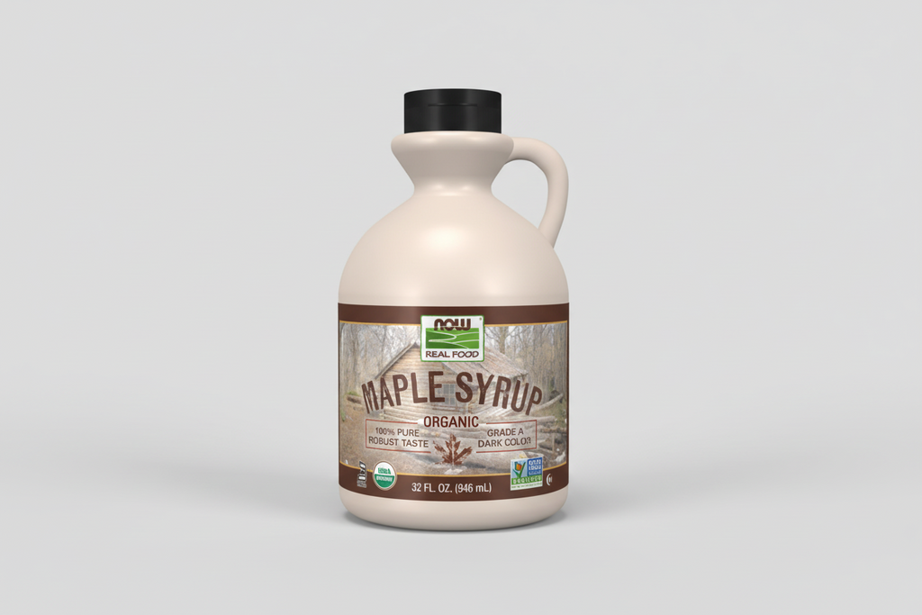 Bottle of NOW Foods Organic Maple Syrup on a white background