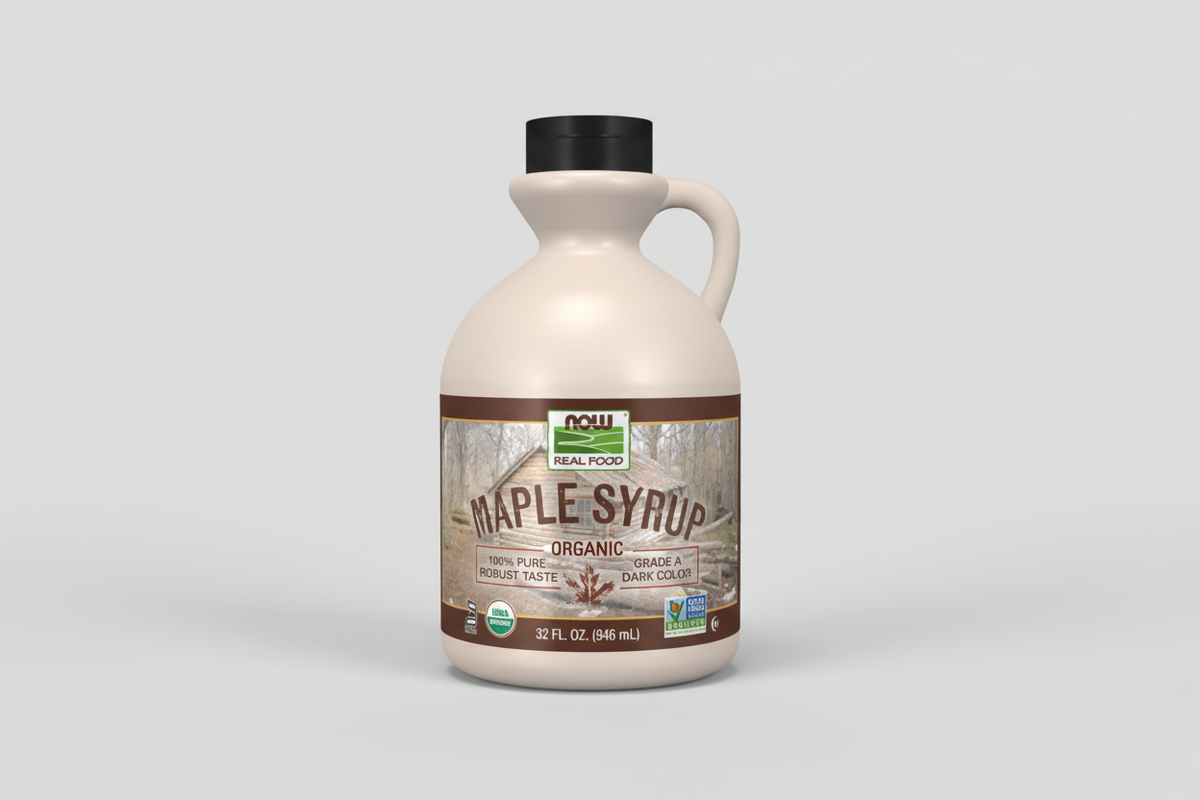 Bottle of NOW Foods Organic Maple Syrup on a white background