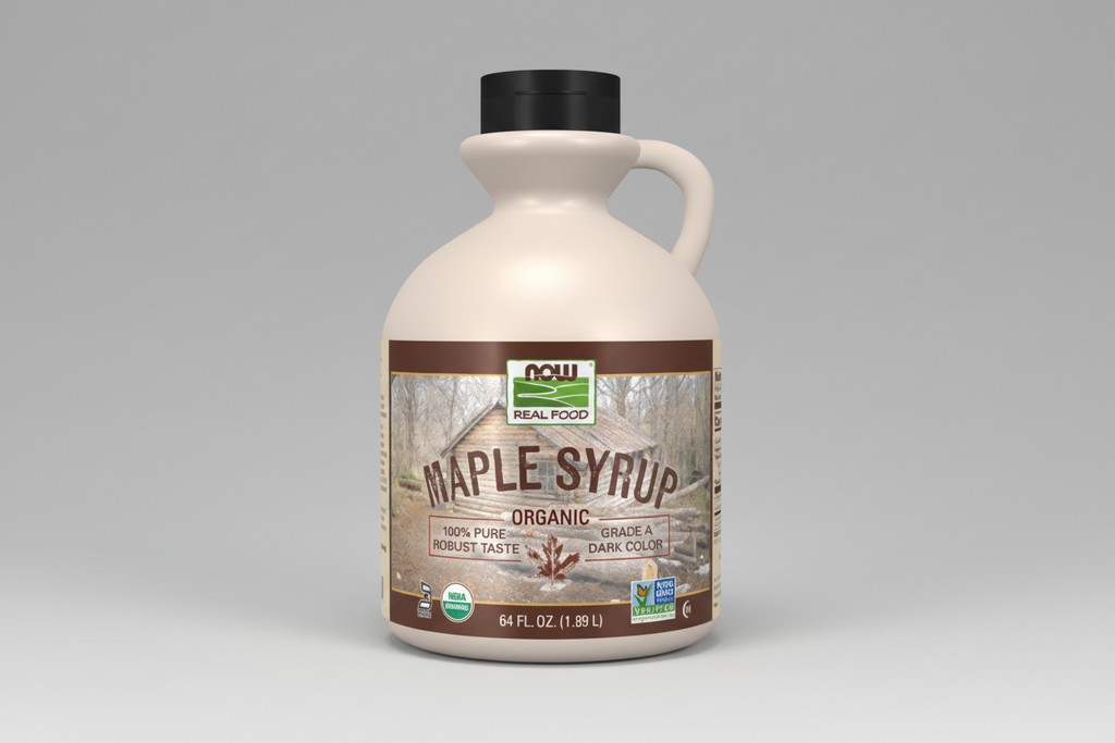 Bottle of NOW Foods Organic Maple Syrup on a white background
