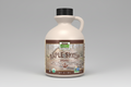 Bottle of NOW Foods Organic Maple Syrup on a white background