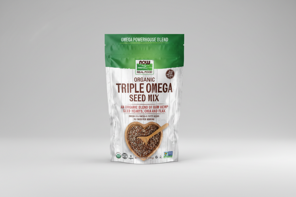 Package of NOW Organic Triple Omega Seed Mix with a wooden spoon on a white background